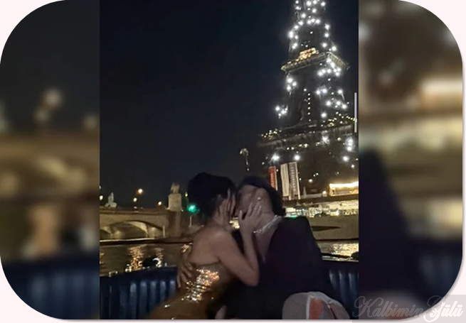 Kim Kardashian ve Lewis Hamilton, Eyfel Kulesi önünde öpüşürken poz veriyor.