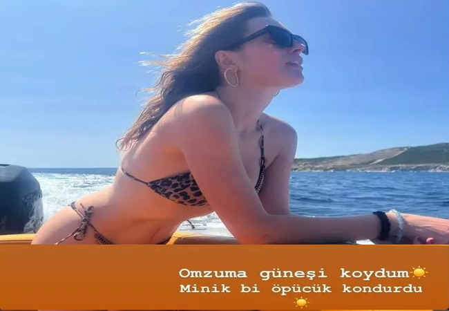 Omzuma güneşi koydum! Minik bir öpücük kondurdu - Magazin Haberleri!